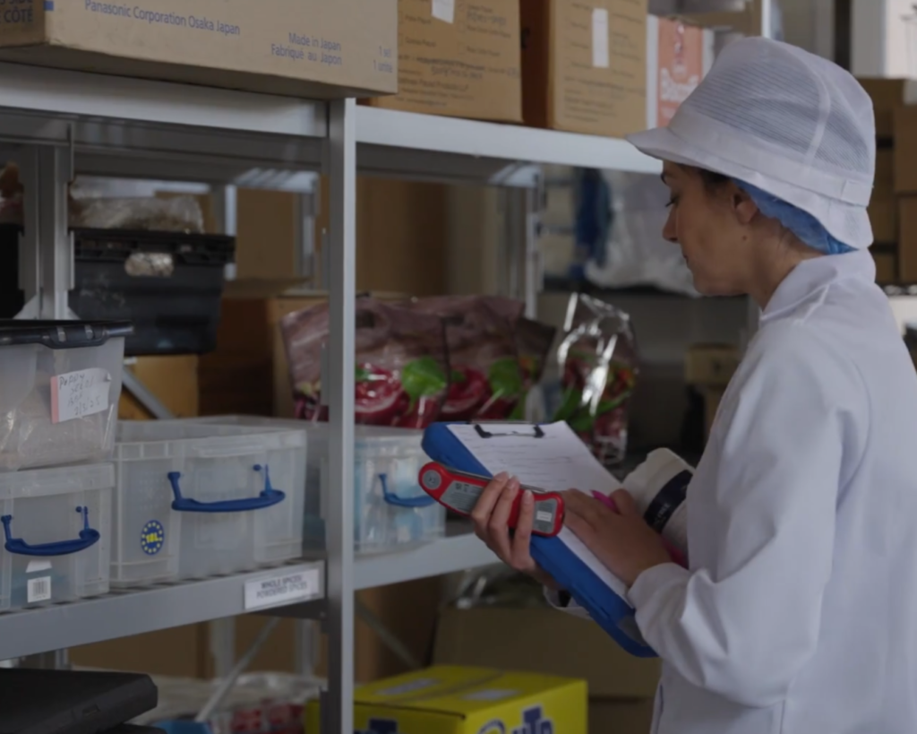 personnel checking the stock rotation system